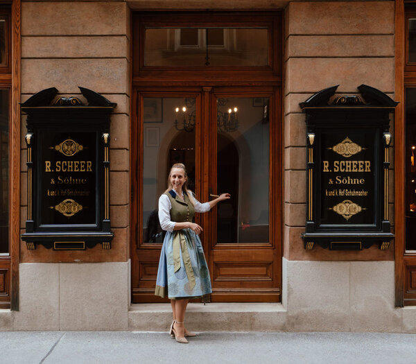 Gertrud Putz in front of the Scheer Shoes store c Victoria Scheer Photography